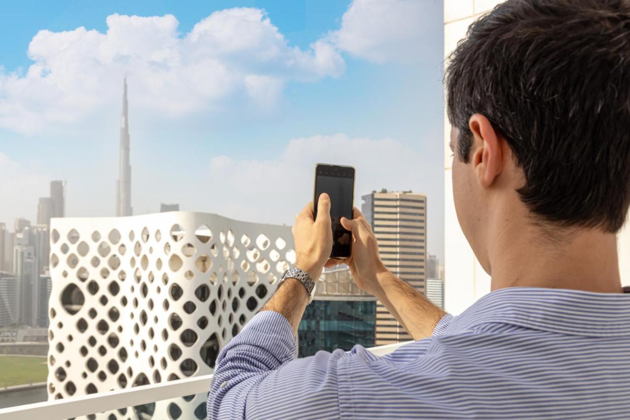 Appartamento Unlock Metropolis Business Bay Dubai Esterno foto
